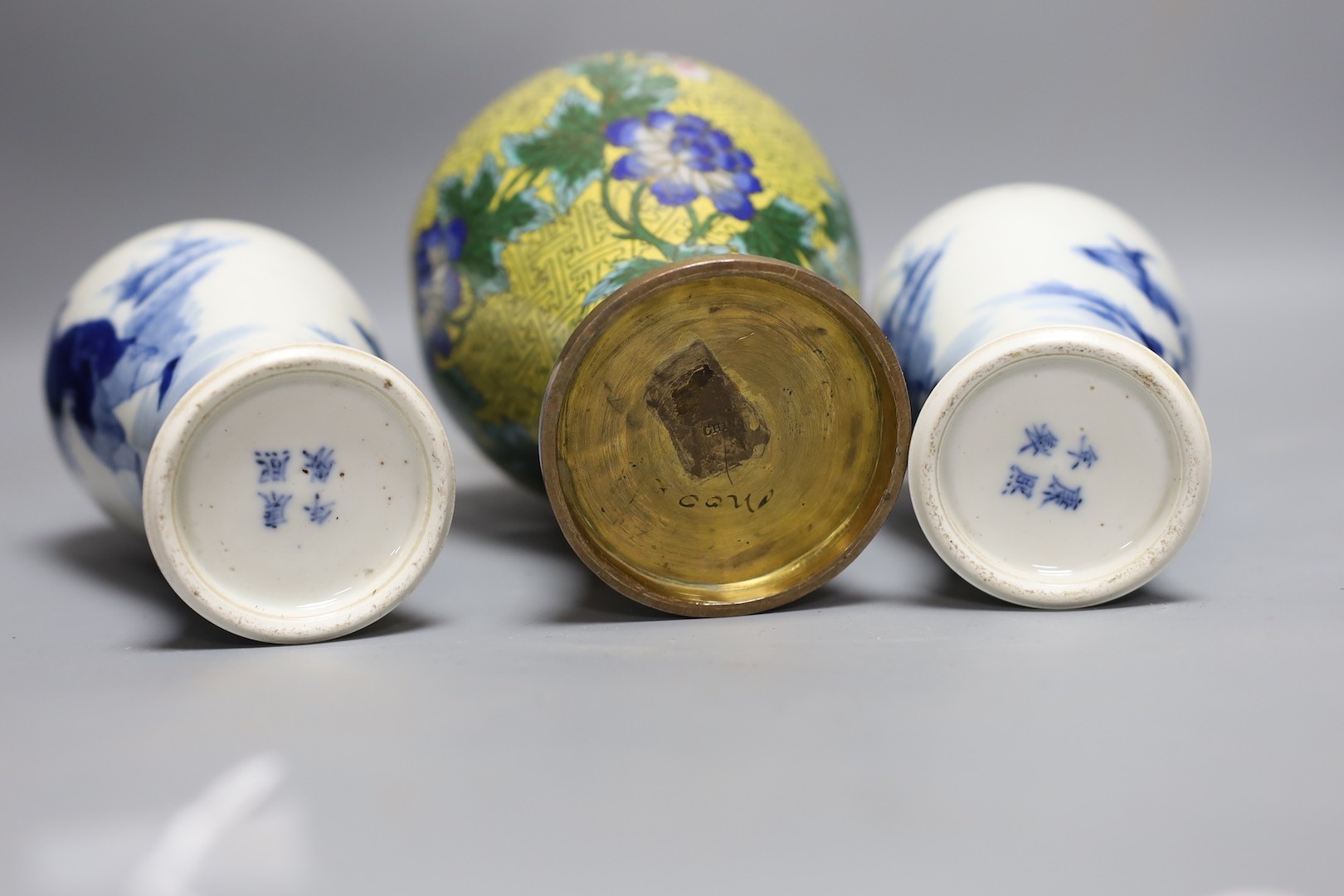 A pair of Chinese blue and white vases and a cloisonné enamel vase 24cm